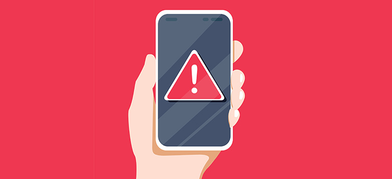 Malicious Apps, hand holding phone with a warning sign on it, red background